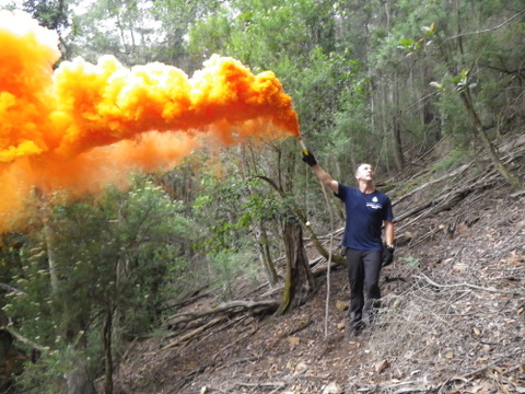 Using a smoke flare to attract the helicopter on the 2010 Combienbar search